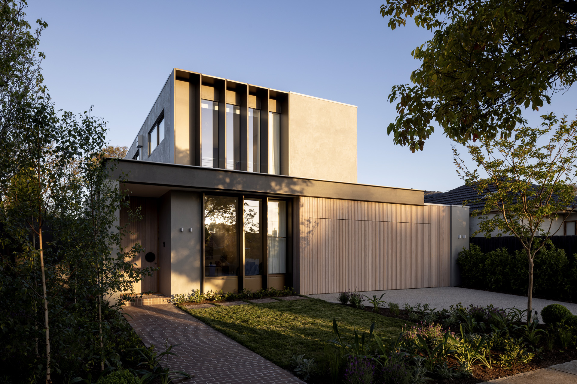 Exterior house Facade, featuring timber slat garage and two storey house